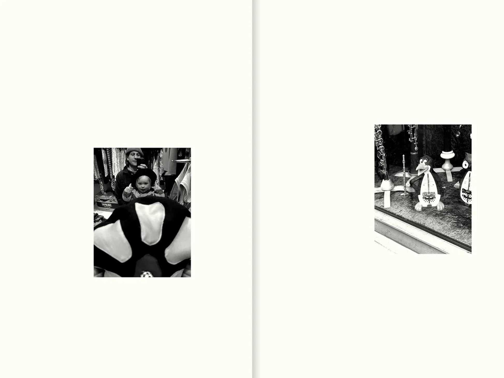 Two small black-and-white photos on white pages from Apartamento All The Stuff We Cooked: left, a woman and child indoors behind a patterned object; right, a store window display with mannequins, hats, and necklaces.