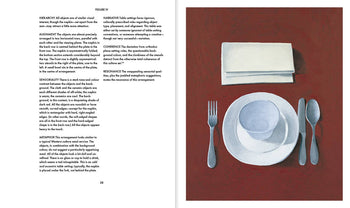 An open book, Apartamento Arranging Things: A Rhetoric of Object Placement by Apartamento, displays text on the left and an artful place setting illustration—plate, bowl, utensils, napkins—on a red table on the right page.