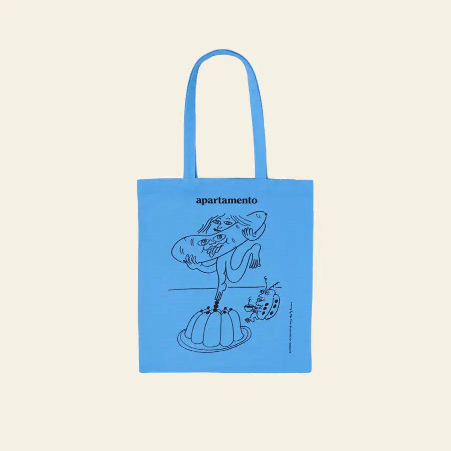 The Apartamento Cookbook #8 Tote Bag by Apartamento features a blue design with playful black line art—a person eating jelly and a surprised cat—ideal for fans of art, food, and eco-friendly style.