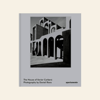 The cover of Apartamento The House of Xavier Corberó features a black-and-white photo by Daniel Riera of geometric arches and shadows in his Esplugues de Llobregat home; published by Apartamento.
