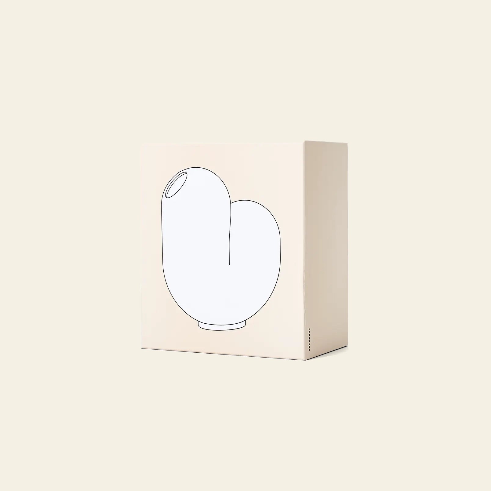 A beige box with a minimalist line drawing of an abstract ceramic vase on the front showcases the Areaware Kirby Vase Jay by Areaware, ideal as a unique bud vase for floral arrangements, all set against a plain light background.