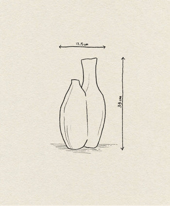 A simple line drawing of the Argot Studio Double Vessel by Argot Studio—two curved vases beside each other. Arrows label its dimensions: 17.5 cm wide and 33 cm tall, set against a textured beige paper background.