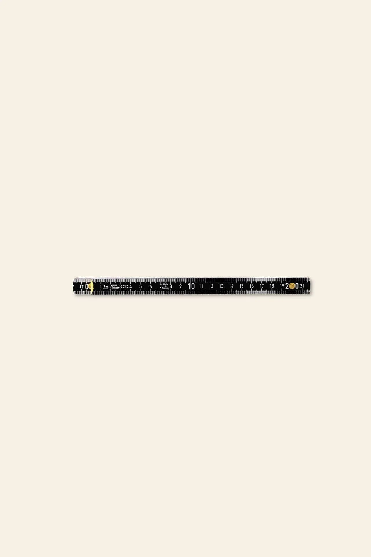 The Artek Folding Ruler by Artek is a black 20-cm ruler featuring white measurement markings and yellow details, designed for precision, shown on a plain light background.