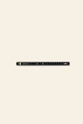 The Artek Folding Ruler by Artek is a black 20-cm ruler featuring white measurement markings and yellow details, designed for precision, shown on a plain light background.