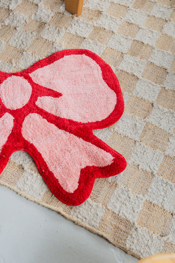 Bitten Boudoir Bow Rug