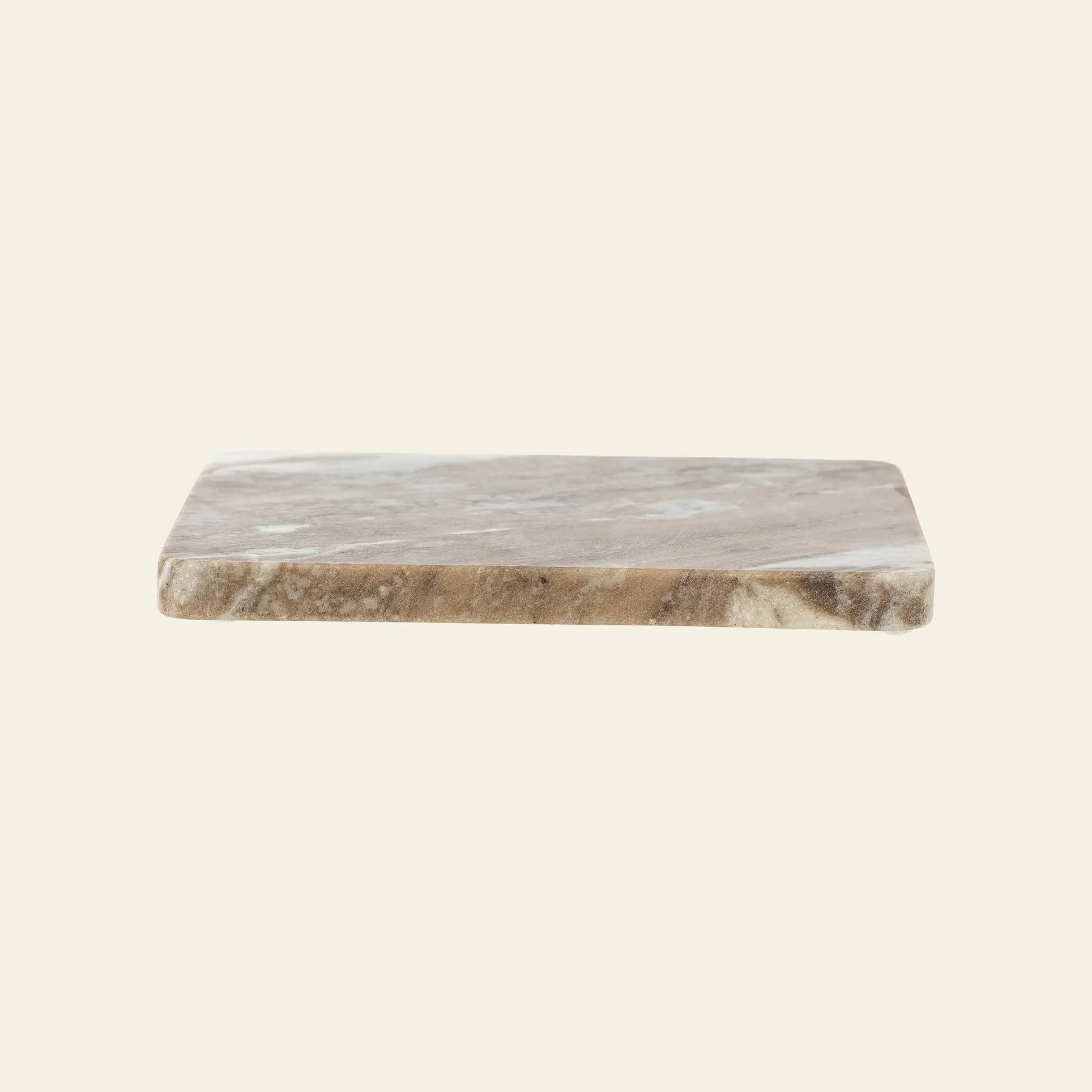 The Bloomingville Gabrielle Trivet by Bloomingville is a rectangular brown and beige marble trivet with smooth, slightly rounded edges—ideal for protecting your table. Displayed against a plain light background.