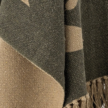 The Bloomingville Geneva Throw by Bloomingville features recycled cotton, a green geometric pattern with beige tones, and fringed edges with tassels—ideal for adding cozy style to your home décor.
