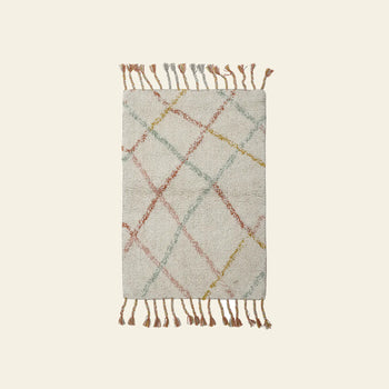 The Bloomingville Lilou Rug by Bloomingville is a rectangular childrens rug with a cream background, intersecting pastel green, orange, and yellow lines, and playful tassels on both shorter sides.