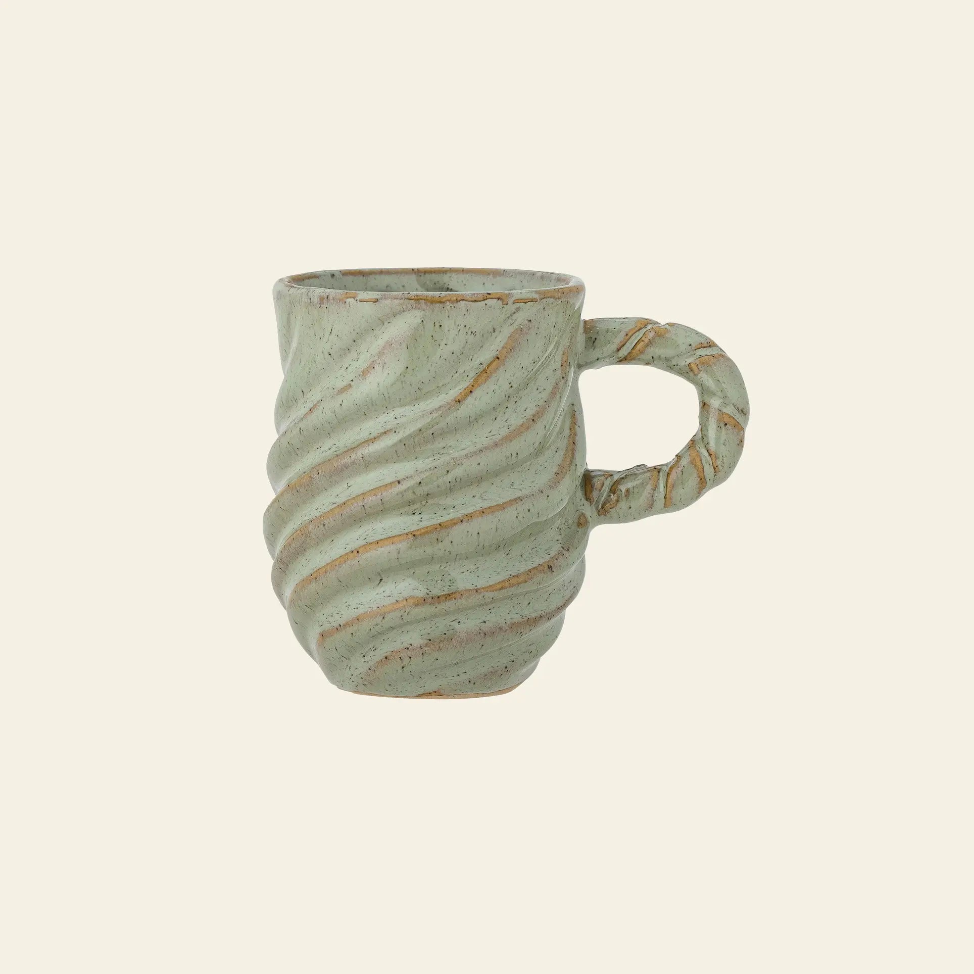 The Bloomingville Miriam Mug boasts a striking twisted design, green glaze, textured speckled pale finish, and a matching twisted handle, all by Bloomingville on a plain light backdrop.