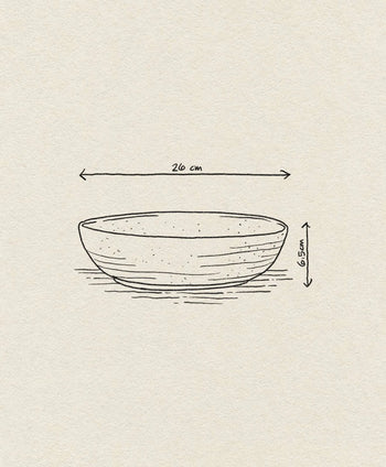 The Bloomingville Taupe Serving Bowl by Bloomingville features a simple line drawing on a textured beige background, highlighting its 26 cm diameter and 6.5 cm height—an elegant addition to any kitchen collection.