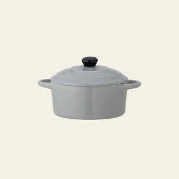 The Bloomingville Thanos Oven Dish w/Lid by Bloomingville is a small, light gray stoneware casserole dish with two side handles, ideal for serving casseroles. Photographed on a plain off-white background.
