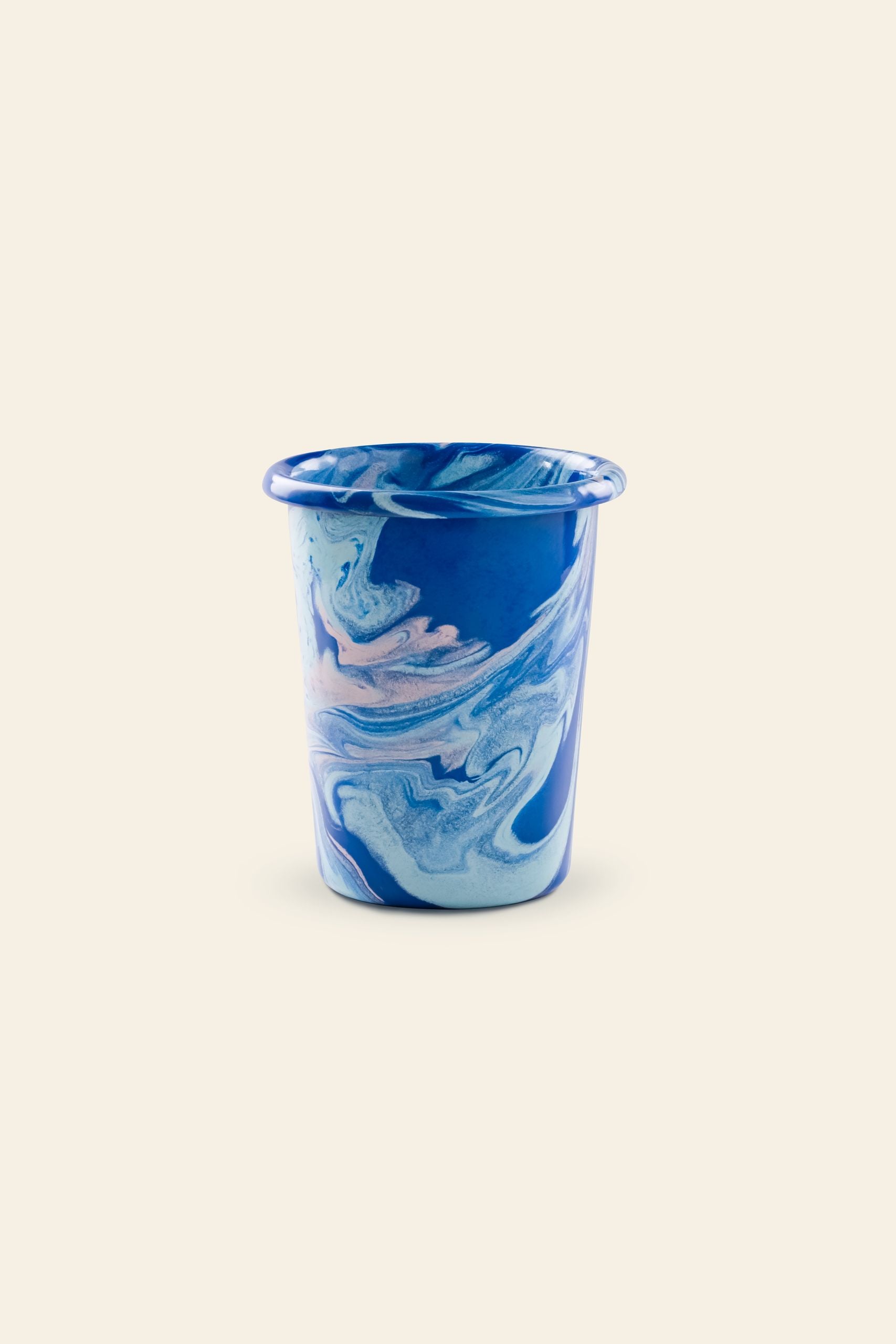 The Stacked Store features the Bornn Enamelware New Marble Tumbler Cup—a cylindrical enamel cup with a marbled blue, white, and pink design and a slightly flared rim, displayed on a plain light background.