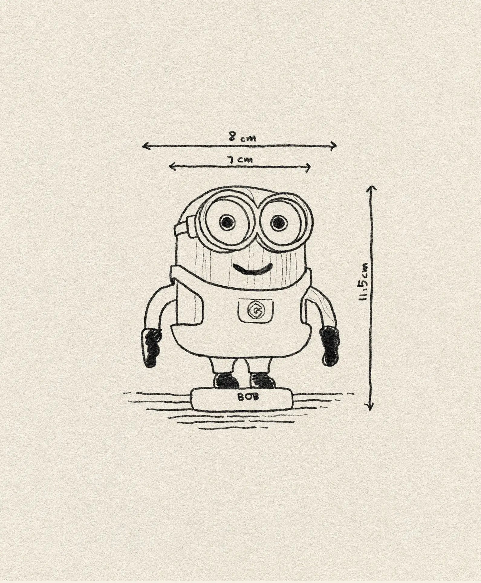 A playful hand-drawn illustration of Boyhood Minion Bob Small by Boyhood, showing Bob smiling in goggles and gloves. Dimensions: 8 cm wide, 7 cm at the head, and 11.5 cm tall.