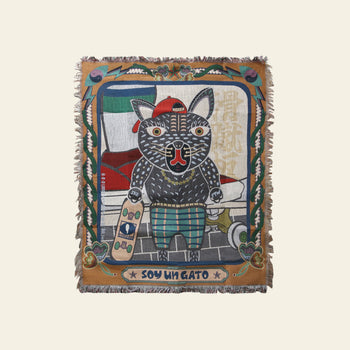 The DETAIL Black Cat Oax Throwket by DETAIL showcases a cartoon black cat in a red hat and plaid pants with a skateboard, car, and plants. SOY UN GATO adds playful flair to this multicolour throw blanket.