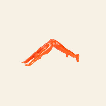 A DETAIL Yoga Joes 9 Figures toy, from the brand DETAIL, features a small orange figurine in a downward dog pose against a light beige background, blending playful army figures with peaceful yoga movement.