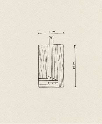 The DOIY Cheeseporn by DOIY is a simple Acacia wood cutting board with a handle, measuring 21x35 cm—perfect as a cheeseboard—shown on a textured beige background.