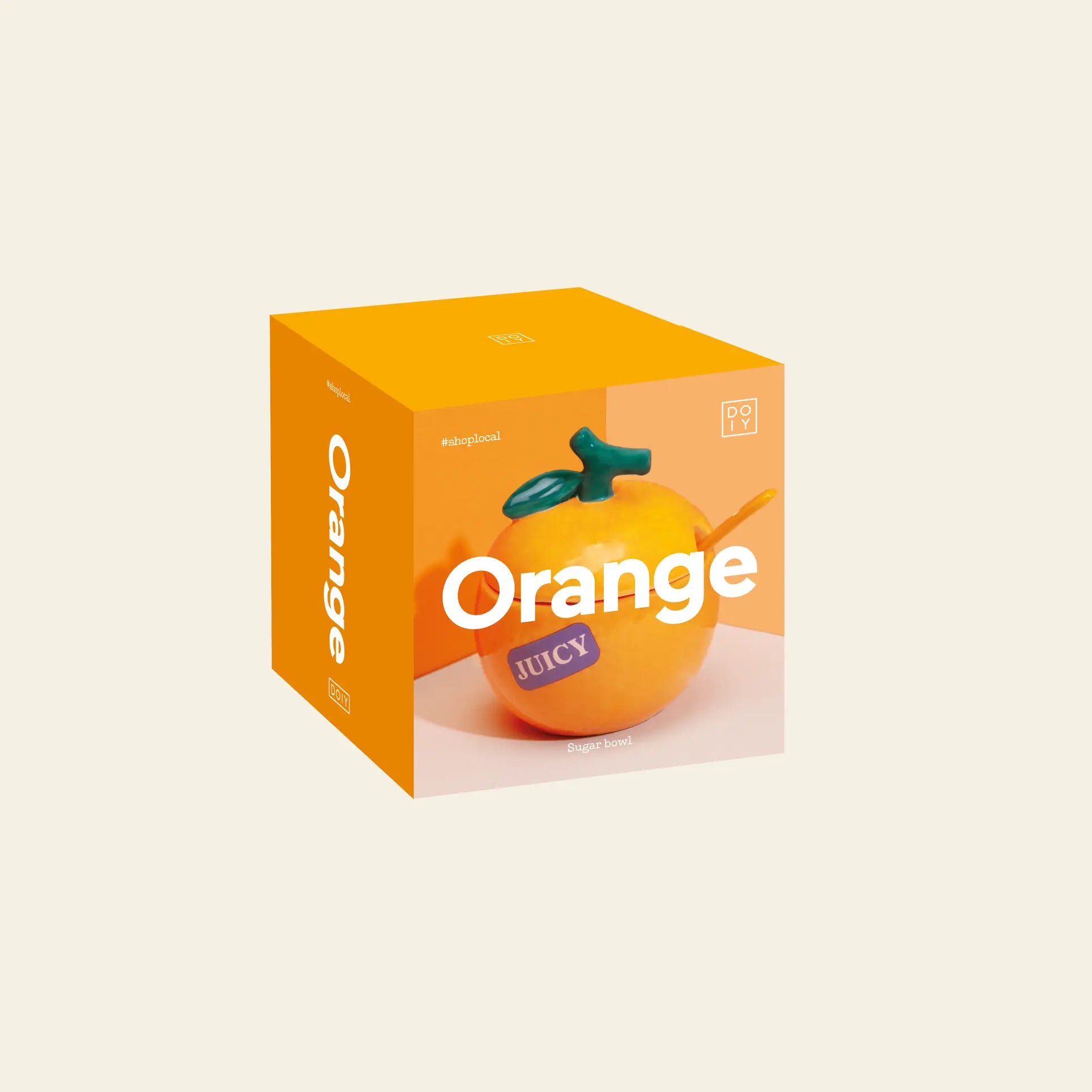 A bright orange box displays the DOIY Farmers’ Market Orange Sugar Bowl, featuring a realistic orange fruit and bold white Orange text on the front, evoking fresh farmers’ market finds against a light beige background.