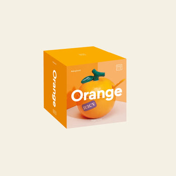 A bright orange box displays the DOIY Farmers’ Market Orange Sugar Bowl, featuring a realistic orange fruit and bold white Orange text on the front, evoking fresh farmers’ market finds against a light beige background.