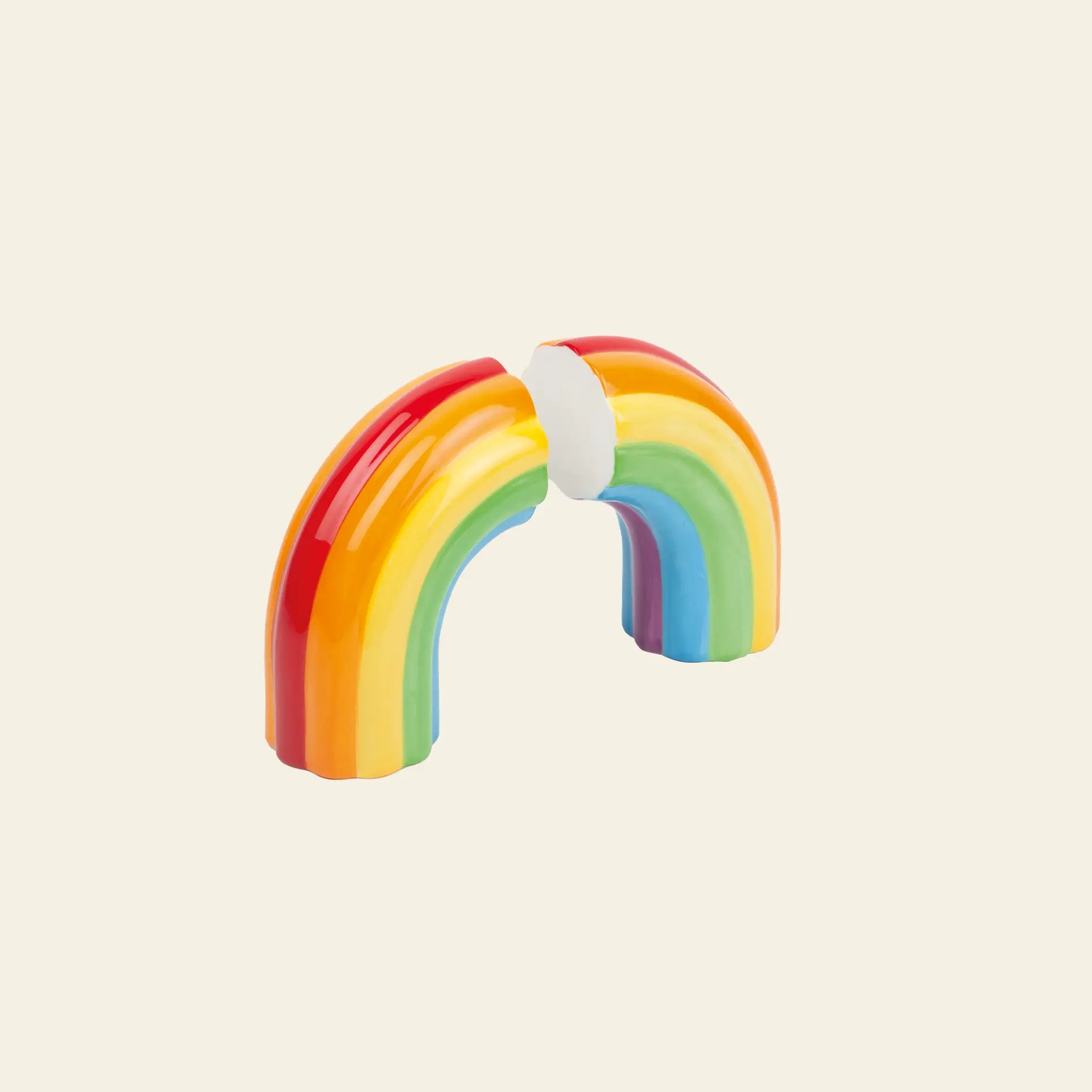 Add a cheerful touch to your home with the DOIY Rainbow Bookend—a vibrant, rainbow-shaped accessory by DOIY. Pair it with matching salt and pepper shakers for bright, whimsical decor.
