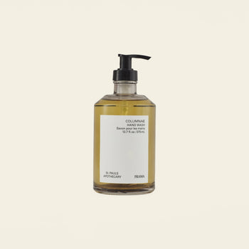 A clear 375ml bottle of yellow liquid hand wash with a black pump dispenser features a white label displaying FRAMA Hand Wash and brand details.