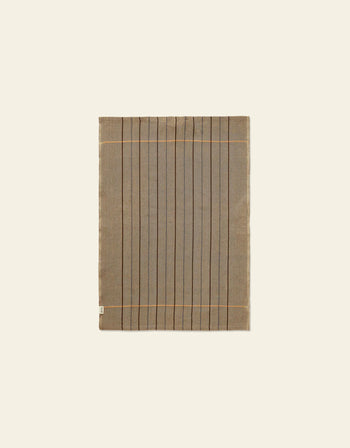 The Ferm Living Ito Tea Towel, Set of 2, features a brown organic cotton twill weave with thin black vertical stripes and two tan horizontal lines near the edges, shown against a plain light beige background.