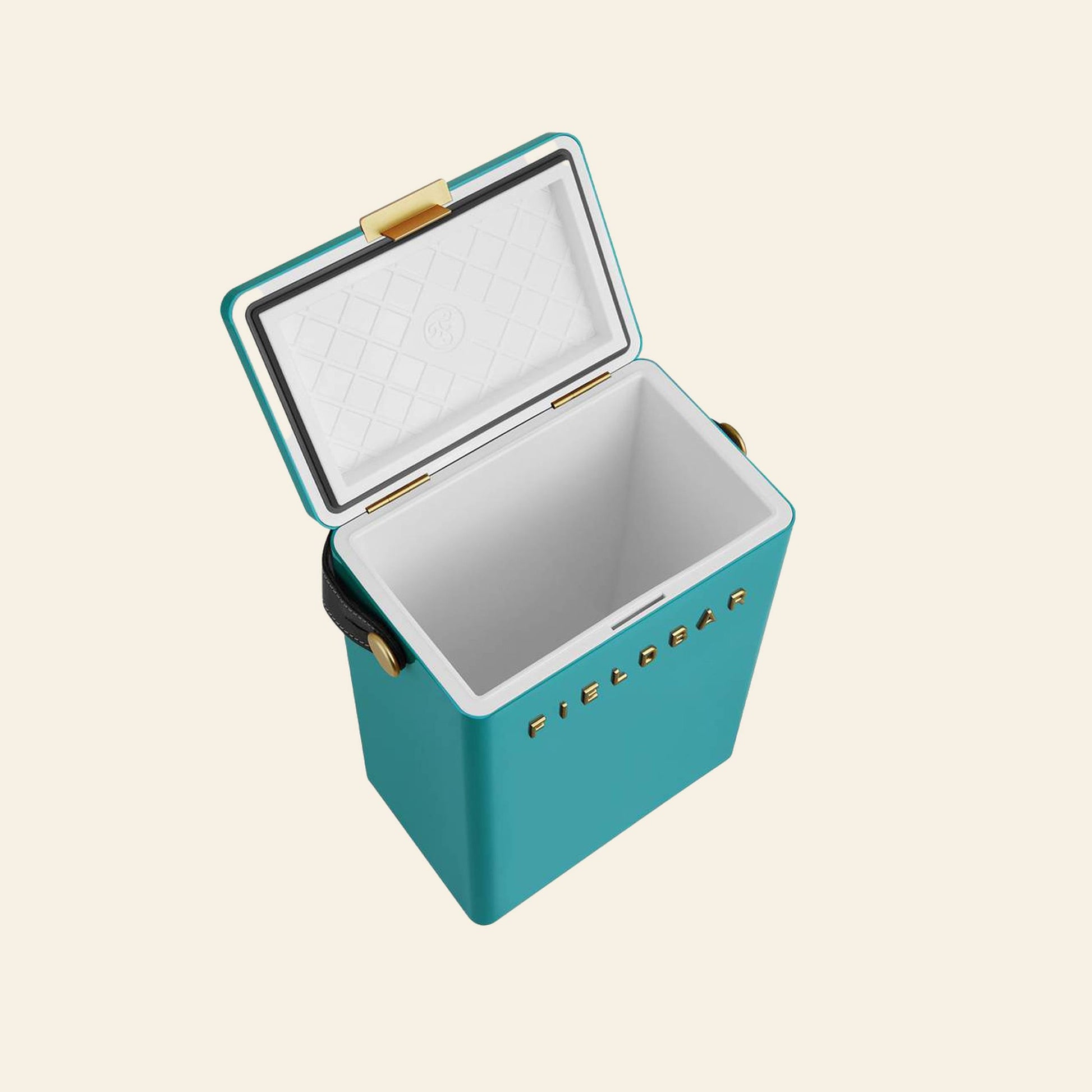 The Fieldbar Drinks Box by Fieldbar is a teal, rectangular ice box with a white interior, open lid, black carrying strap, gold accents, and “FIELDBAR” on the front—offering both stylish design and excellent thermal performance.
