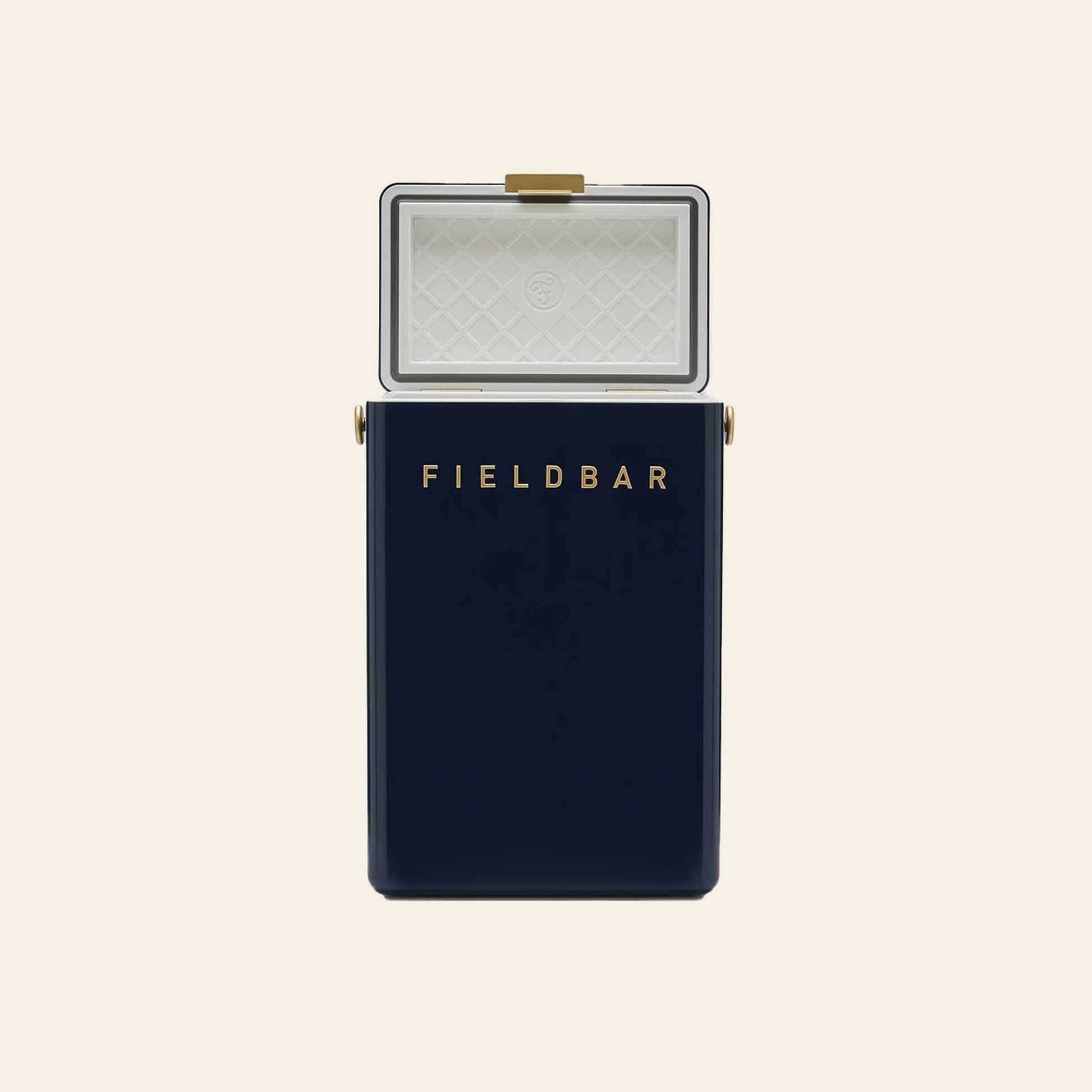 A Fieldbar Drinks Box by Fieldbar in navy blue with a white interior and gold accents is displayed open against a plain light background.