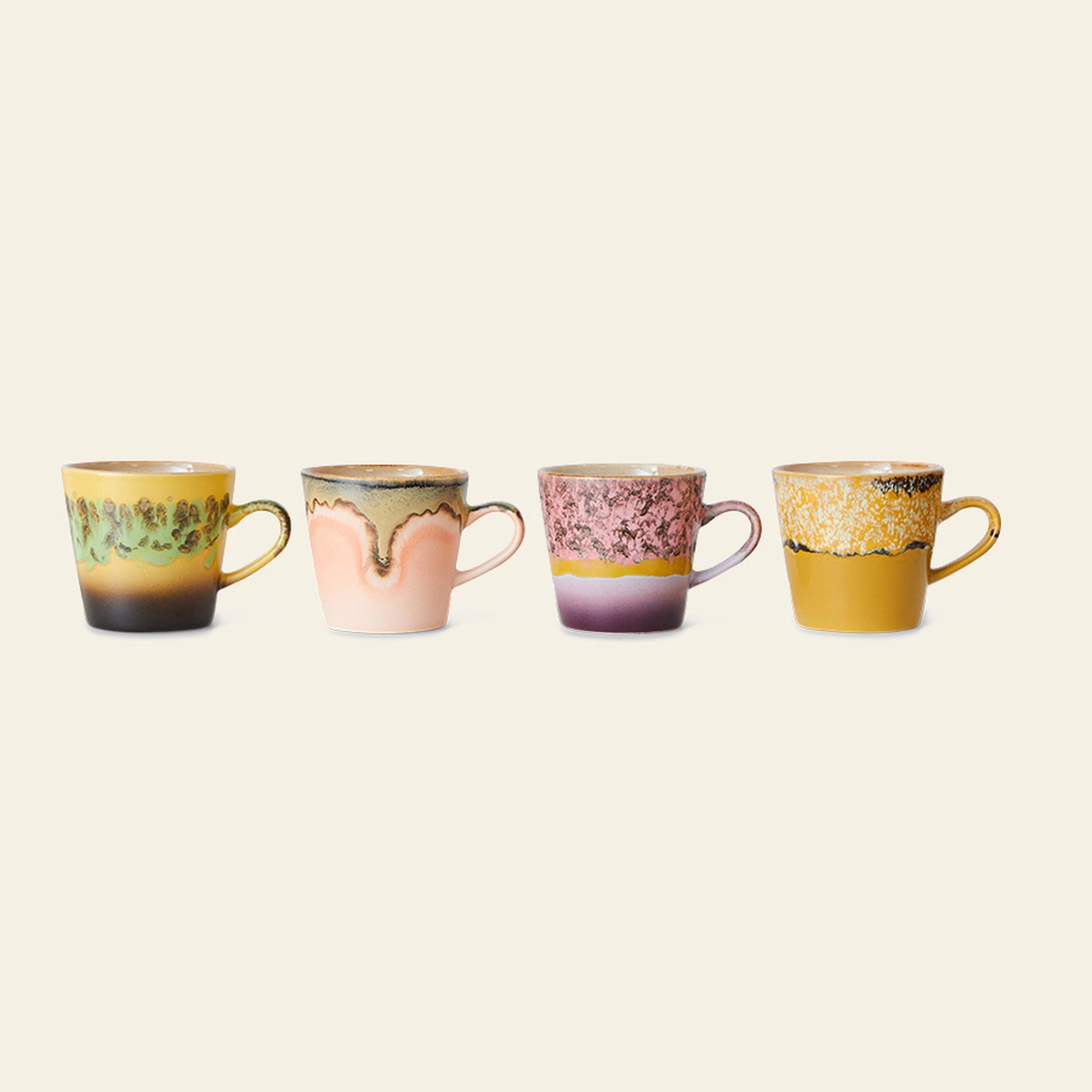The HKLIVING 70s Ceramics: Americano Mugs, Set of 4, showcases colorful, hand-glazed stoneware mugs with unique designs and artistic textures, inspired by vintage 70s ceramics and arranged on a plain background.