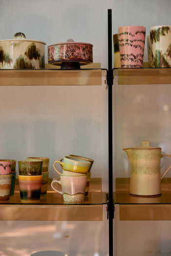 HKLIVING 70s Ceramics Americano Mugs, Set of 4, feature colorful, earthy patterns and are beautifully arranged for a cozy, artistic display on gold shelves.