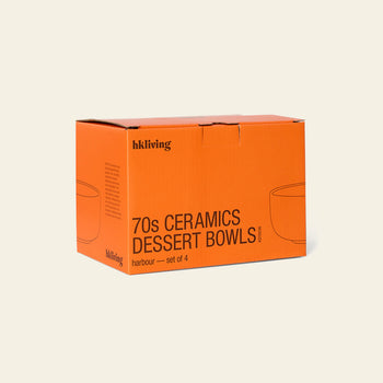 An orange box labeled HKLIVING 70s Ceramics: Dessert Bowls, Set of 4 from HKLIVING features simple bowl illustrations on a light beige background, evoking playful retro vibes.