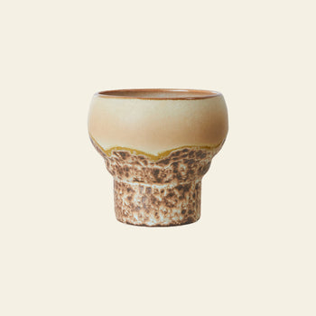 The HKLIVING 70s Ceramics: Lungo Mugs, Set of 2, by HKLIVING, features wide rims, narrow bases, and a design with a textured brown lower half and smooth beige upper half, inspired by classic 70s ceramic mugs.