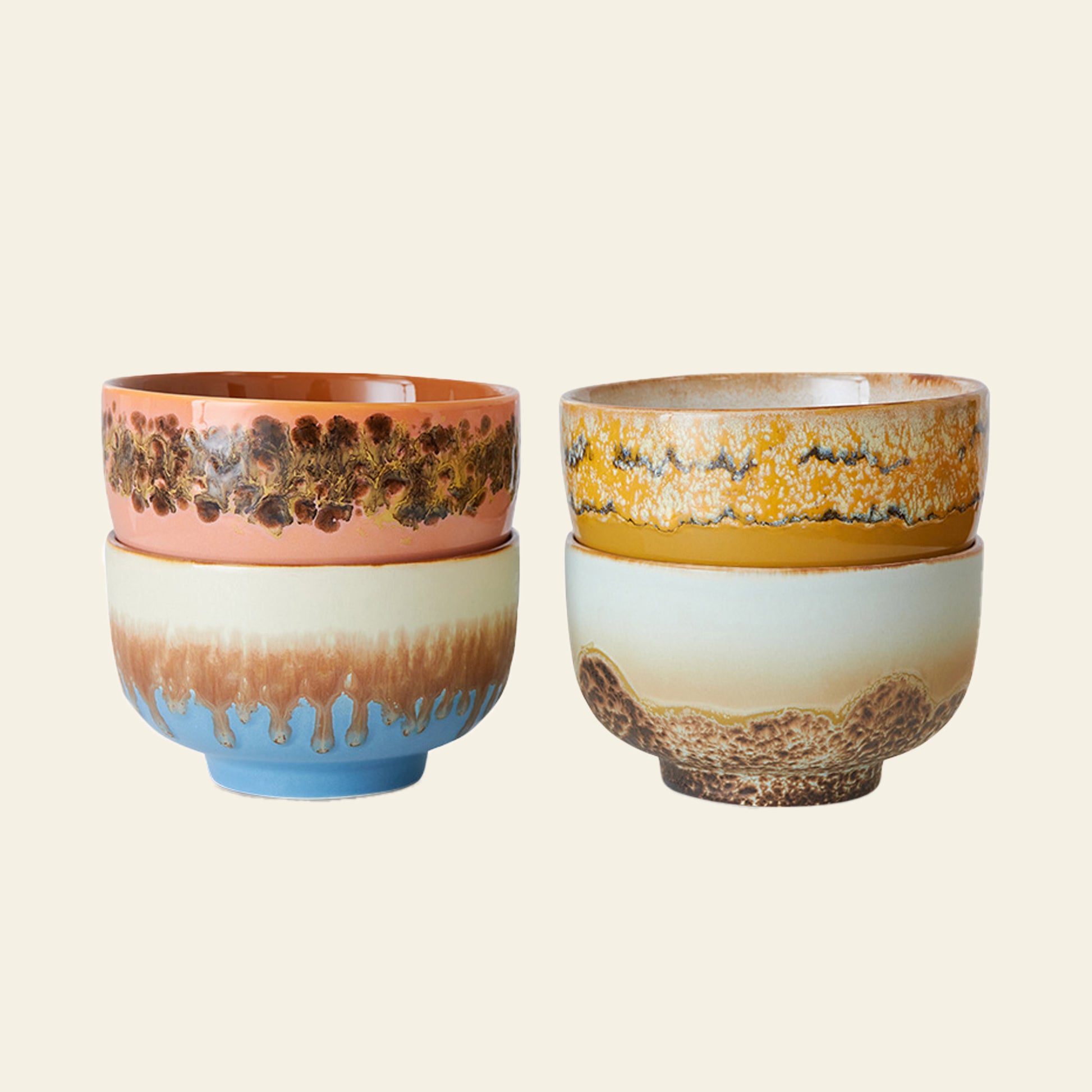The HKLIVING 70s Ceramics: Noodle Bowls, Set of 4 features vibrant stoneware in retro-inspired multicolored glazes, with unique floral and earthy tones reminiscent of classic 1970s design.