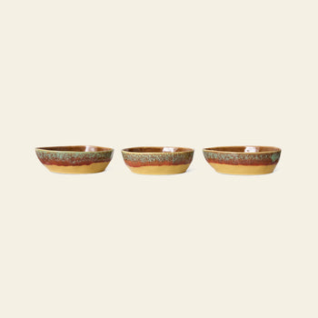 The HKliving 70s Ceramics: Pasta Bowls, Set of 2 features glossy, earth-toned glazes in brown, orange, and green stripes for a retro touch—perfect vintage-inspired tableware to elevate any setting.
