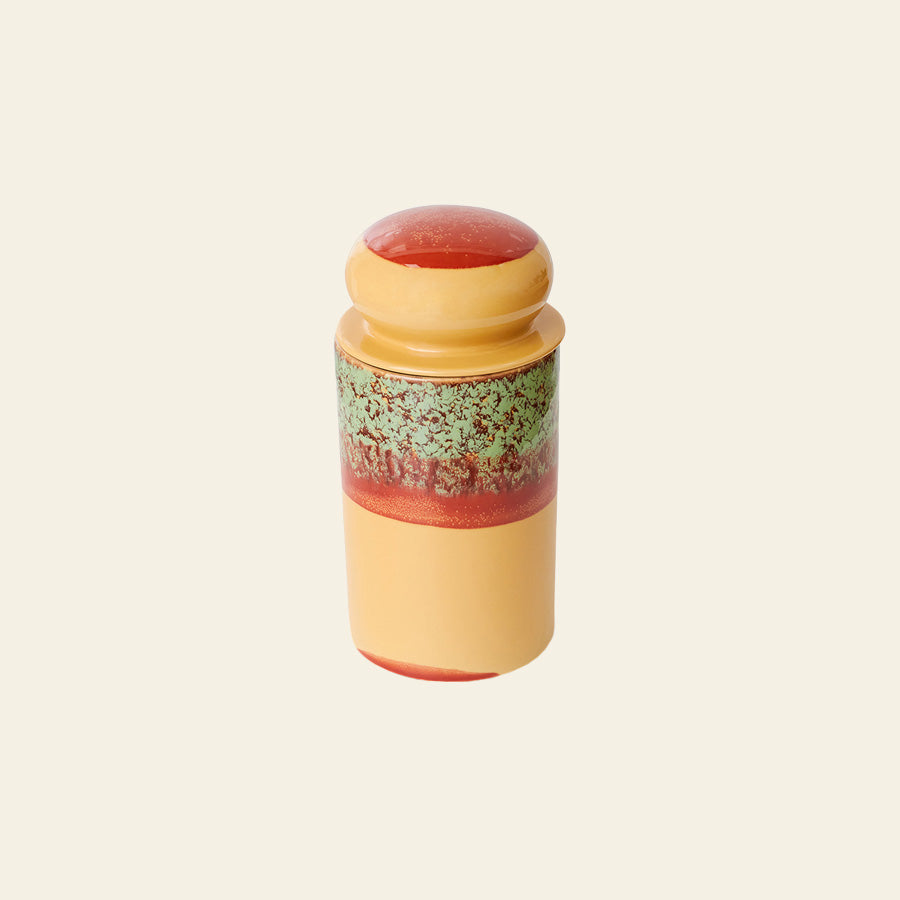 The HKLIVING 70s Ceramics: Storage Jar - Cove features a rounded lid, yellow base, green speckled midsection, and red accent near the top, all set against a plain beige background.