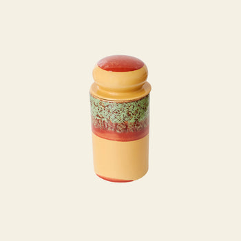 The HKLIVING 70s Ceramics: Storage Jar - Cove features a rounded lid, yellow base, green speckled midsection, and red accent near the top, all set against a plain beige background.