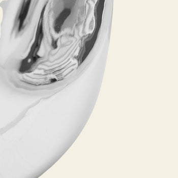 Close-up of the curved bowl of the HKLIVING Currents Chrome Side Table, featuring a polished chrome finish with smooth reflections—an elegant accent for contemporary interiors by HKLIVING.