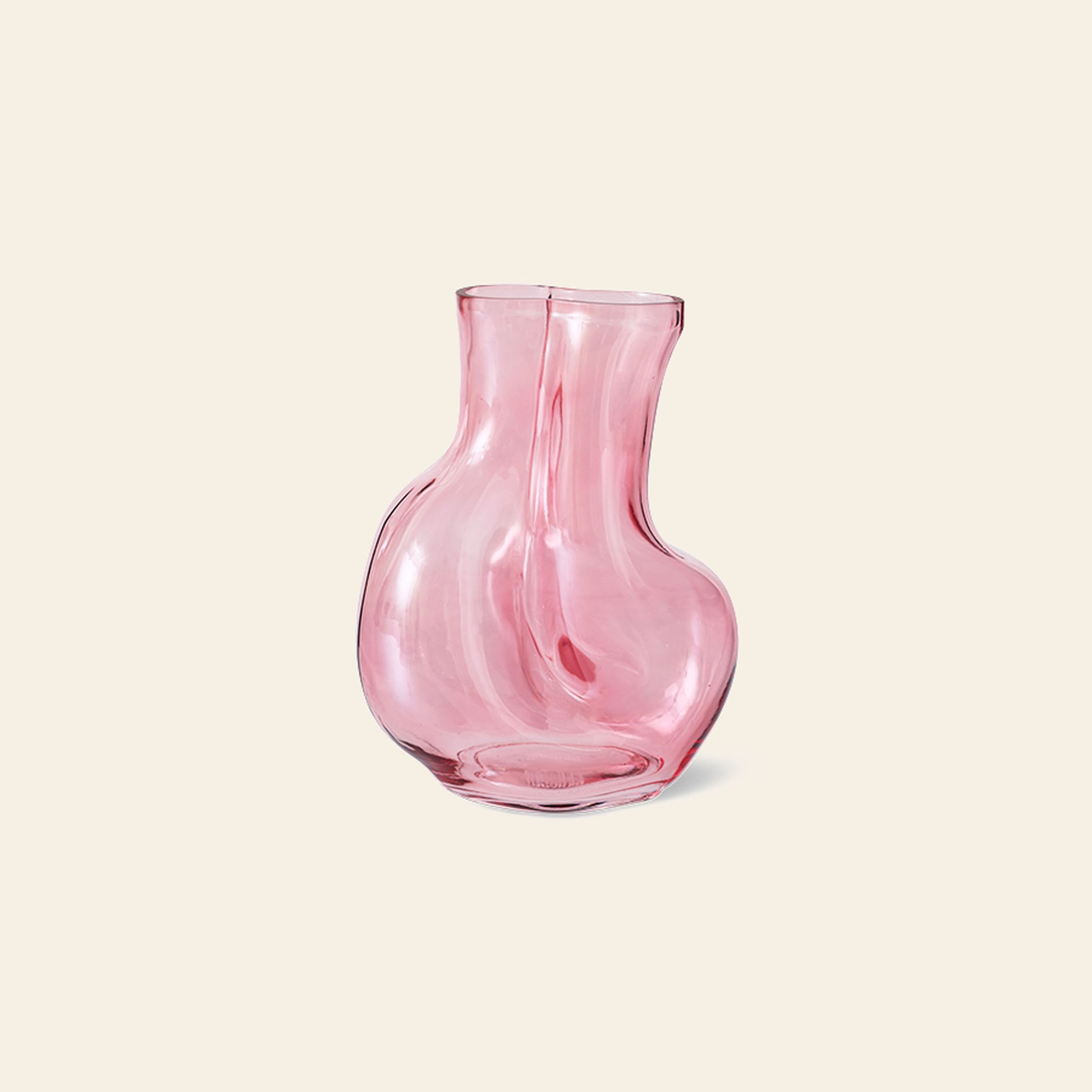 The HKLIVING Gleam Glass Vase by HKLIVING is a pink, translucent piece with a wavy, rounded shape and narrow opening—an eye-catching decor accent displayed on a light beige background, ideal for modern spaces.