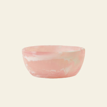 The HKLIVING Patio Bowl by HKLIVING features a small, round shape with a smooth, glossy pastel pink finish and subtle white marbled resin patterns—ideal for stylish outdoor entertaining on a plain light background.