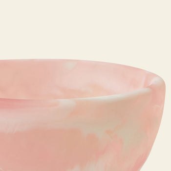 A close-up of the HKLIVING Patio Bowl by HKLIVING, featuring its smooth, glossy pink marbled resin and rounded edge against a light beige background—perfect for stylish outdoor entertaining.