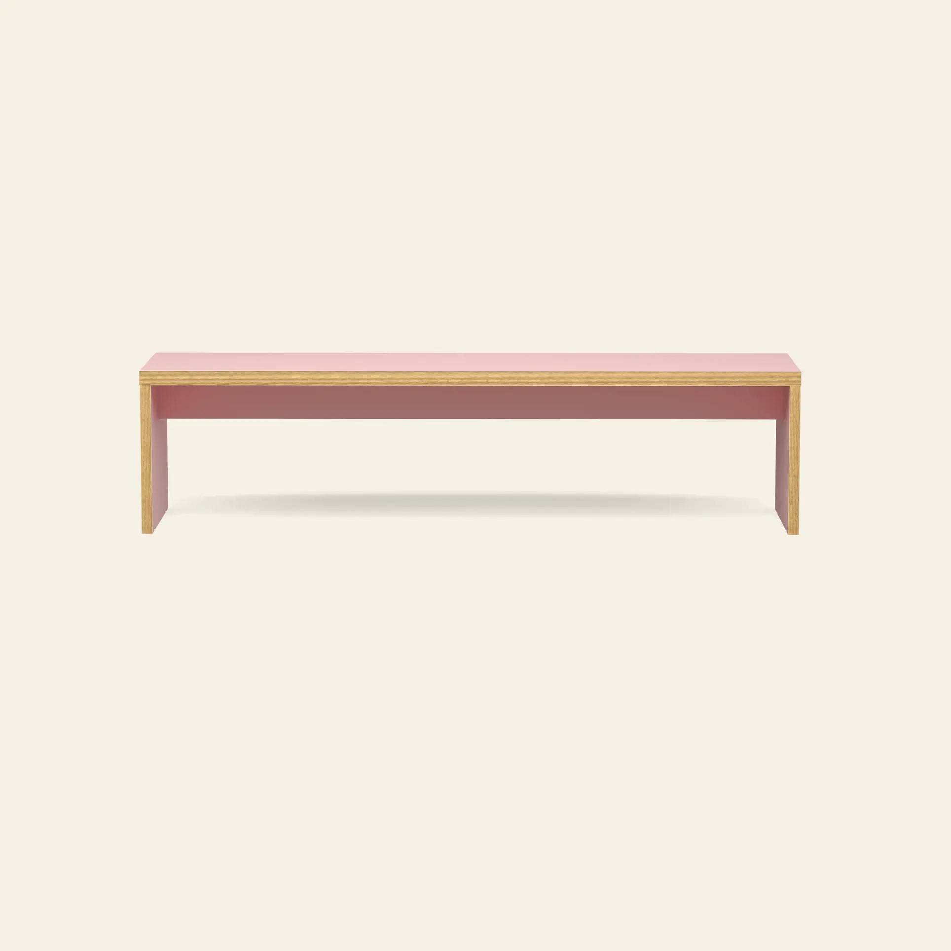 The HKLIVING Bench, 180cm by HKLIVING features a minimalist wooden frame and pink top, set against an off-white background—ideal as versatile seating for modern interiors.