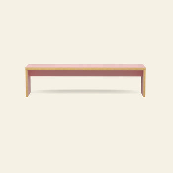 The HKLIVING Bench, 180cm by HKLIVING features a minimalist wooden frame and pink top, set against an off-white background—ideal as versatile seating for modern interiors.