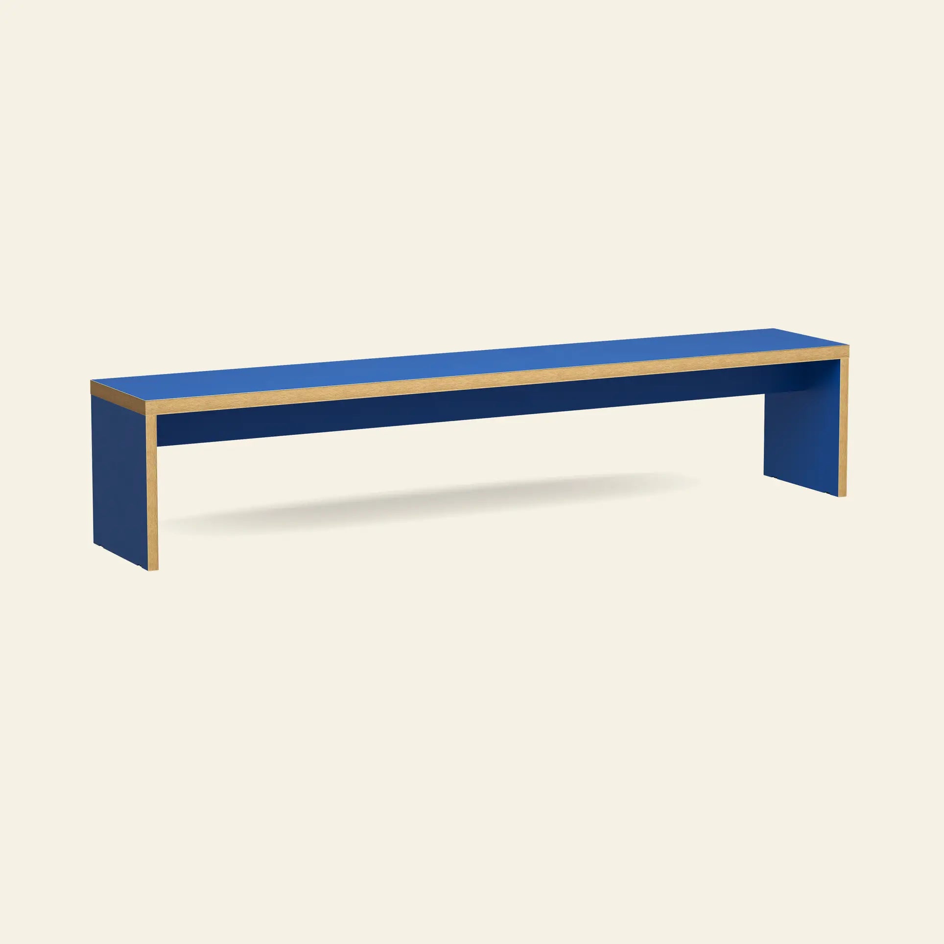 The HKLIVING Bench, 220cm features a minimalist blue design with straight lines, rectangular legs, and visible wood edges for space-saving seating, displayed against a plain off-white background.