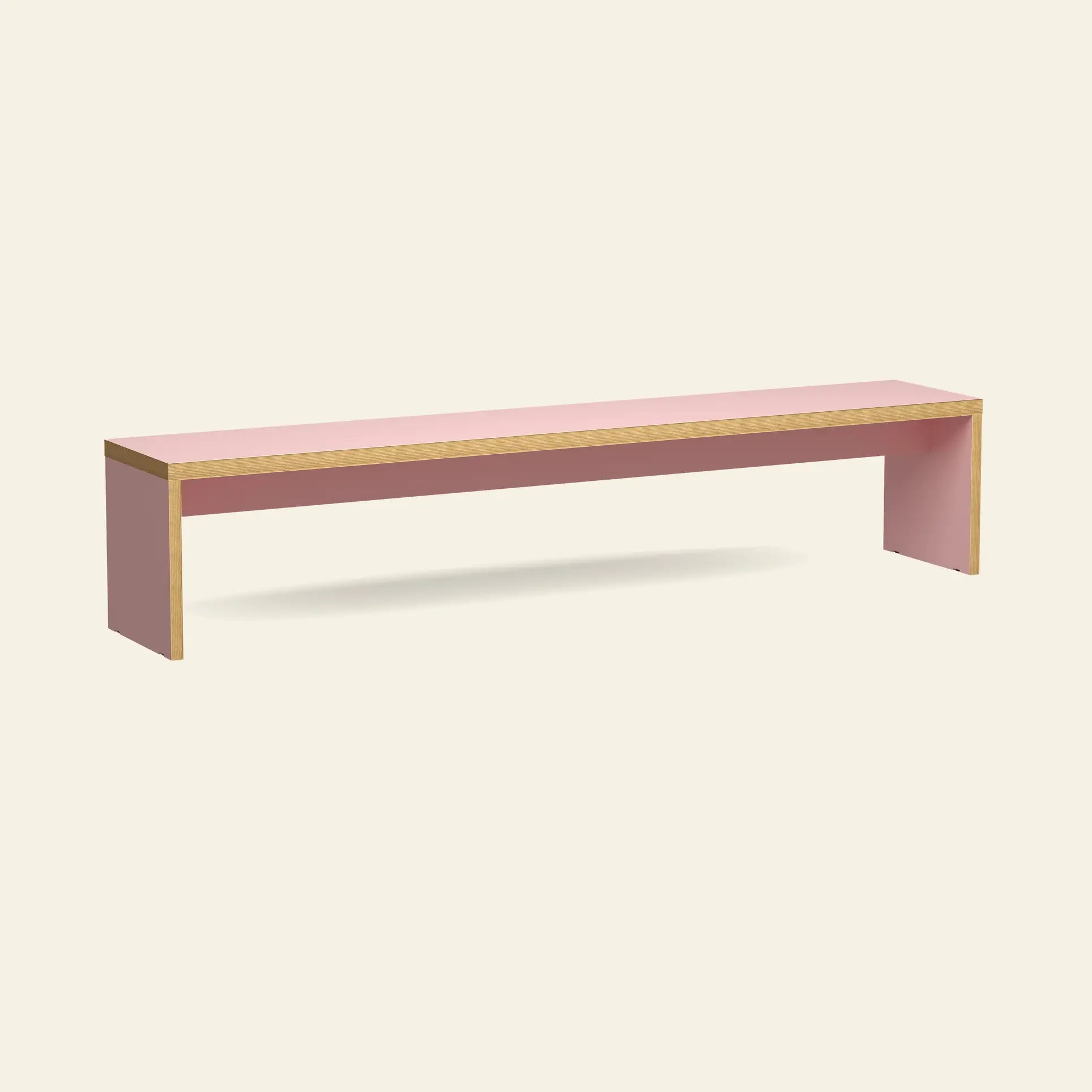 The HKLIVING Bench, 220cm, is a minimalist pink rectangular bench with light wooden edges by HKLIVING, designed for space-saving seating and shown against an off-white background.