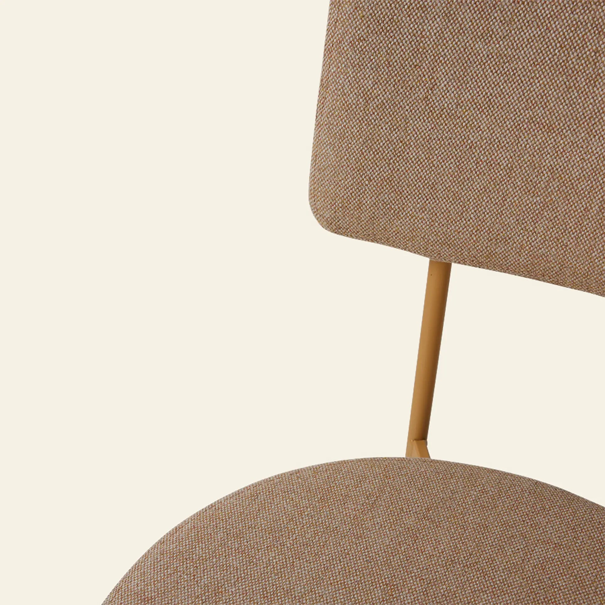 Close-up of the HKLIVING Dining Chair in Main Line Flax, Dusty by HKLIVING, featuring a textured light brown fabric seat and backrest with a slender light wood or metal frame set against an off-white background.