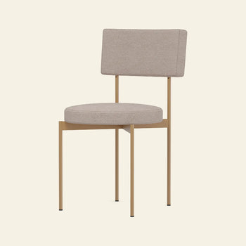 The HKLIVING Dining Chair, Main Line Flax in Dusty by HKLIVING features a light beige cushioned seat and backrest on a sleek gold metal frame with four straight legs, shown against a plain off-white background.