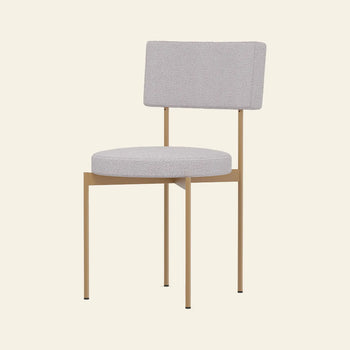 The HKLIVING Dining Chair, Yoredale, Dusty features a round, light gray cushioned seat and backrest with slim gold metal legs, showcasing Dutch craftsmanship against an off-white background.
