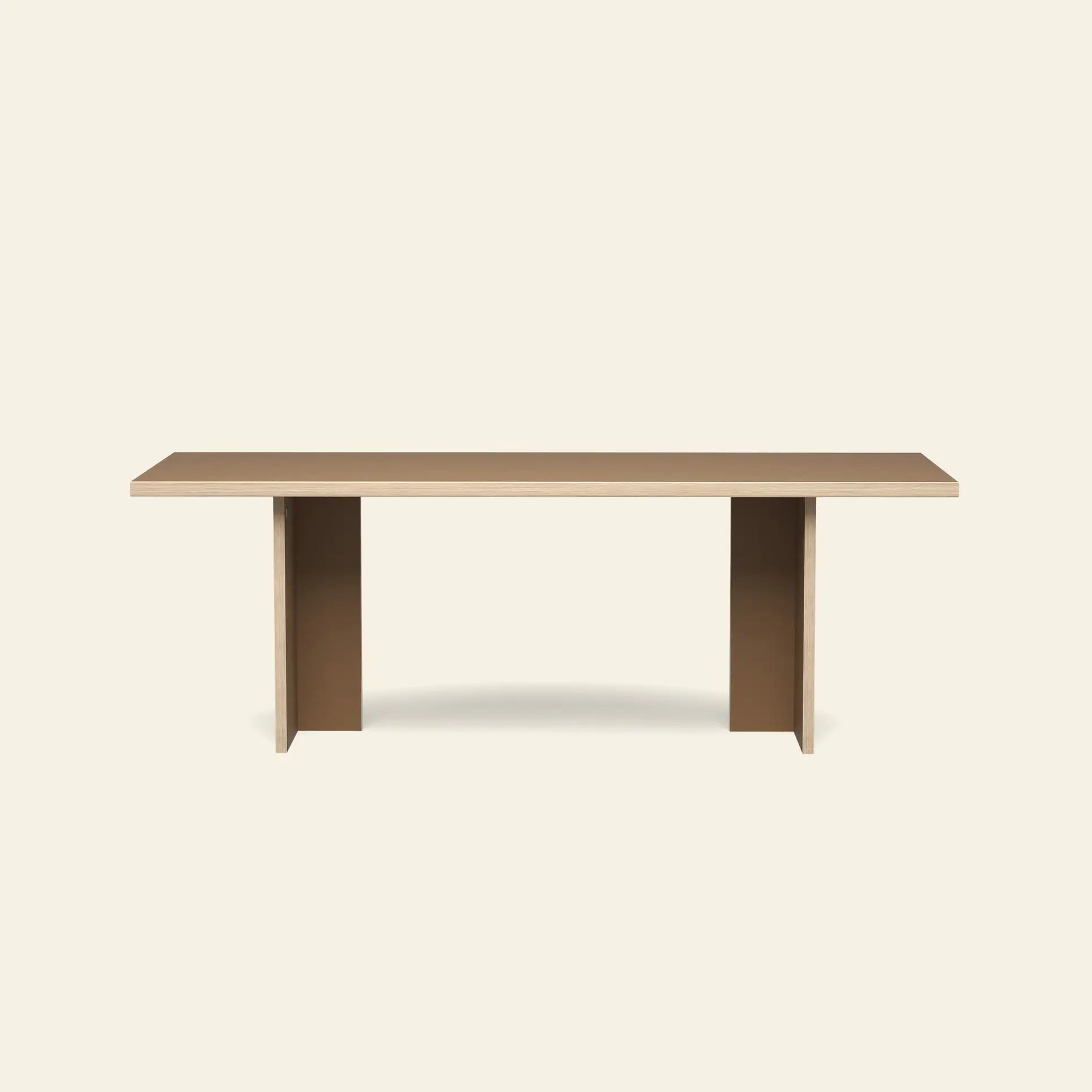 The HKLIVING Dining Table, Rectangular, 220cm by HKLIVING features a minimalist wooden top with two wide flat legs, styled against a plain light beige backdrop.