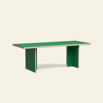 The HKLIVING Dining Table, Rectangular, 220cm by HKLIVING features a green top, green panel legs, and exposed plywood edges, shown against a plain beige background.