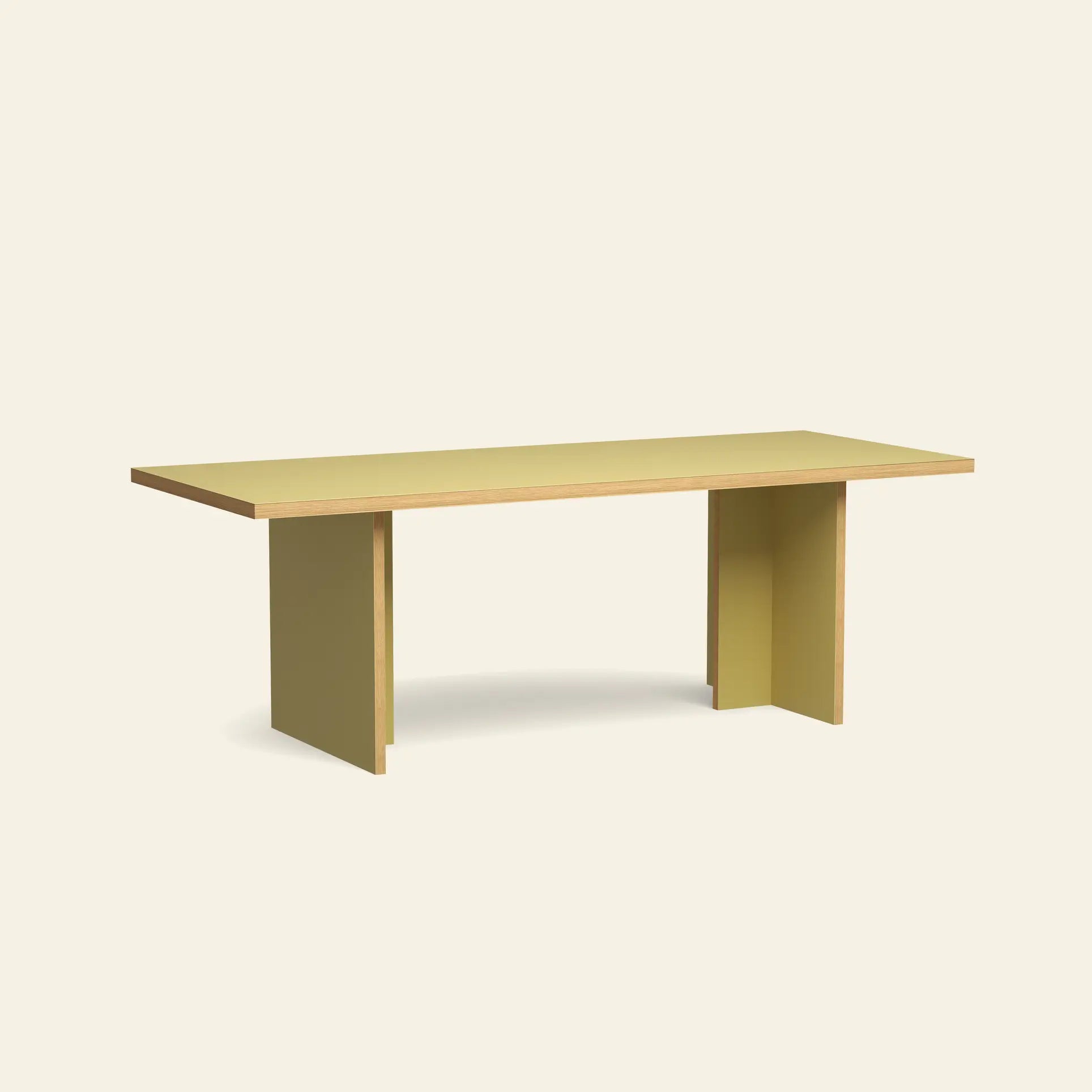 The HKLIVING Dining Table, Rectangular, 220cm features a modern design with a light yellow top and thick flat panel legs, displayed against an off-white background.