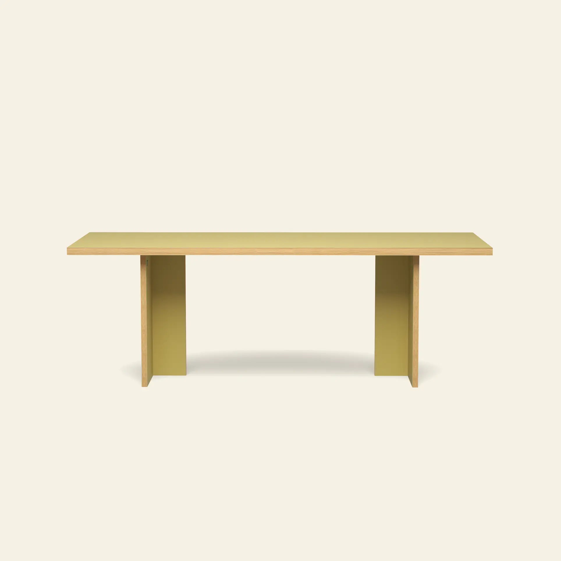 The HKLIVING Dining Table, Rectangular, 220cm by HKLIVING features a light wood top and two wide, flat yellow legs, shown against a plain beige background.